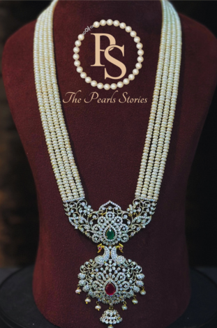 Gold pendant necklace on neck
